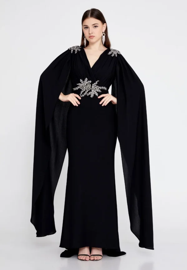 Amber Black – Elegant Cape-Sleeve Gown with Embellished Waist