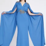 Amber Blue Elegant Cape-Sleeve Gown with Embellished Waist