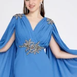 Amber Blue– Elegant Cape-Sleeve Gown with Embellished Waist