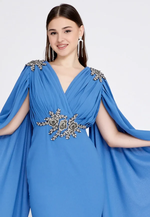 Amber Blue– Elegant Cape-Sleeve Gown with Embellished Waist