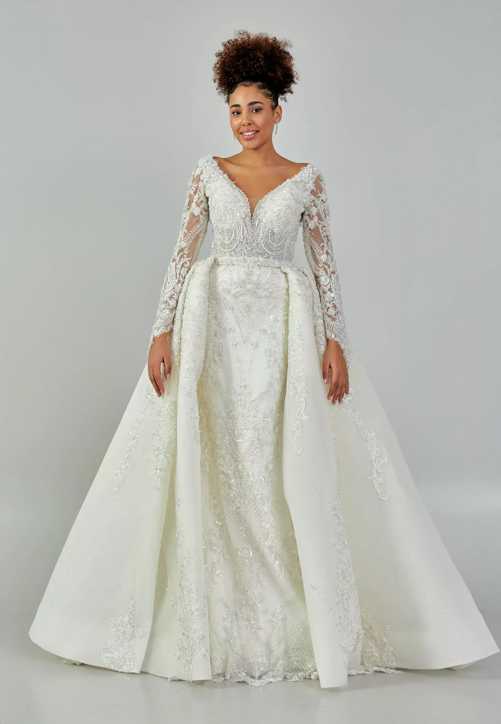 Zeenat – Ivory Bridal Gown with Long Lace Sleeves and Embroidered Overskirt